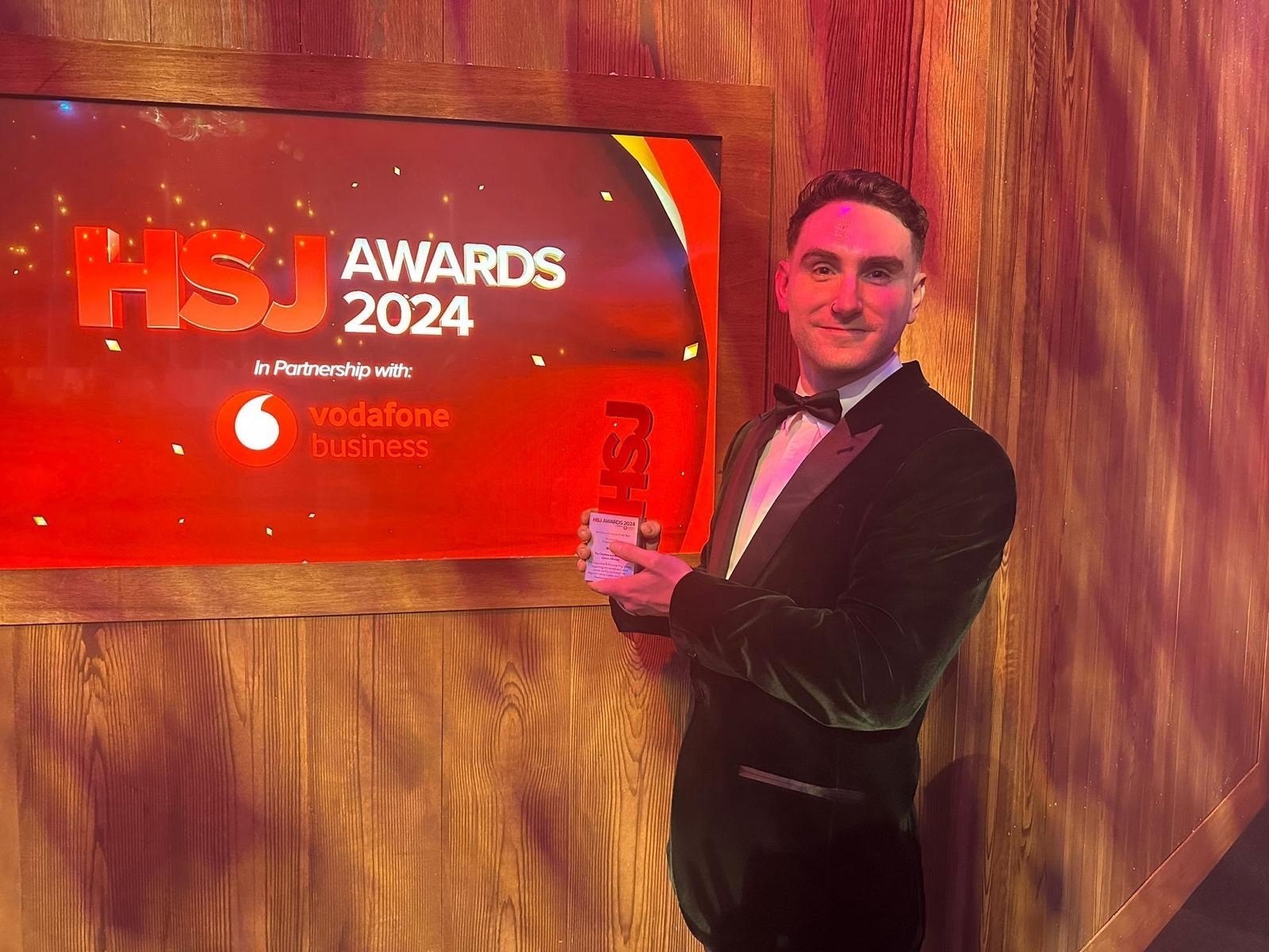 ACCEND lead Robbie Coffin with the HSJ Award.jpg